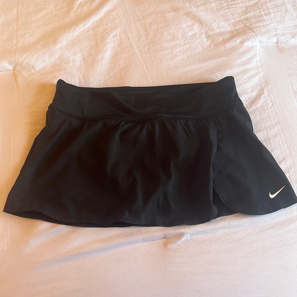NIKE brand new never worn! Darling womens workout skirt. Has undies attached.
